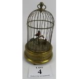 20th century pressed and gilded metal clockwork birds in cage, working order, 30cm height x 16cm