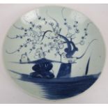 An 18th century/19th century Japanese blue and white ceramic dish. 28cm diam. Condition report: