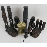 Collection of African carved figures and heads. Assorted hard woods and zebra skin drum,