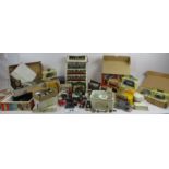 Large collection of diecast and model vehicles, many in original packaging, 00 gauge train and