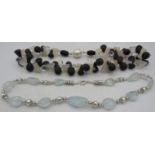 A topaz & white metal necklace with 925 marked lobster clasp, approx 18" long and a black onyx &