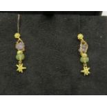 A pair of Links of London 18ct yellow gold (posts and backs marked) peridot & amethyst 'starfish'