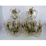 A pair of good quality vintage ornate period-style gilt-metal and cut glass drop chandeliers, each