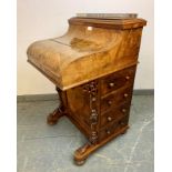 A good Victorian burr walnut piano-top Davenport, with brass ¾ gallery and rising stationary