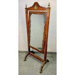 A fine 19th century French parquetry inlaid cheval mirror, with ormolu mounts and finials, on