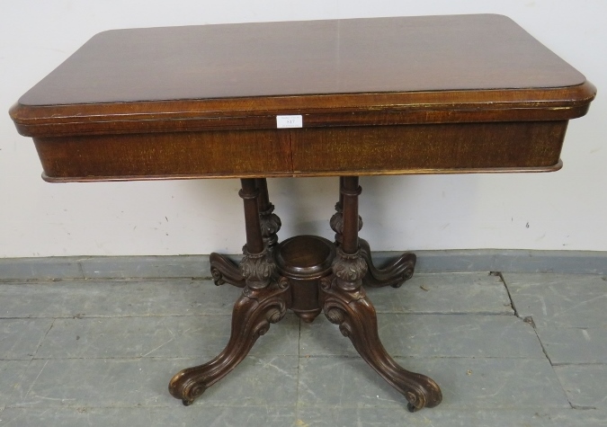 A Victorian oak and mahogany turnover card table, with green baize and two blind drawers under, over