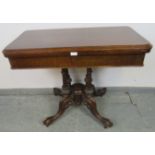 A Victorian oak and mahogany turnover card table, with green baize and two blind drawers under, over
