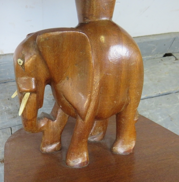 A vintage teak square table with carved stand in the form of an elephant, on a plinth base with - Image 3 of 3