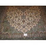 A good Persian Kashan carpet pale blue on cream. In very good condition. 368cm x 244cm.