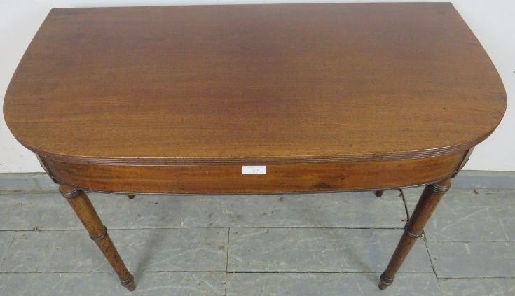 A George III mahogany turnover card table, with reeded edge, on tapering turned supports. H71cm - Image 3 of 5