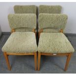Four mid-century beech dining chairs by Beautility, retaining the original textured seat upholstery,