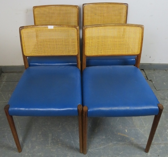A set of four mid-century Danish teak ‘Model 80’ dining chairs by Niels Moller, with woven rattan