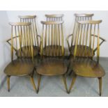 A set of six (4+2) mid-century elm and beech Goldsmith dining chairs by Ercol, on canted supports