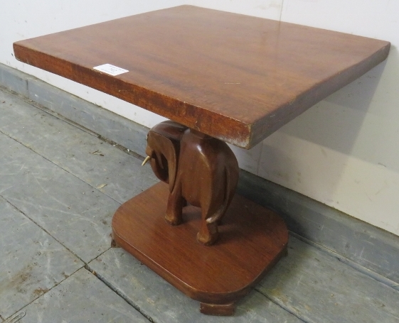 A vintage teak square table with carved stand in the form of an elephant, on a plinth base with - Image 2 of 3