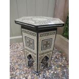 A highly decorative Moorish octagonal occasional table, with mother of pearl and bone