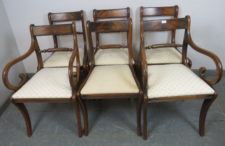 A set of six (4+2) Regency Period rope back dining chairs, with drop-in seat pads upholstered in a