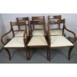 A set of six (4+2) Regency Period rope back dining chairs, with drop-in seat pads upholstered in a