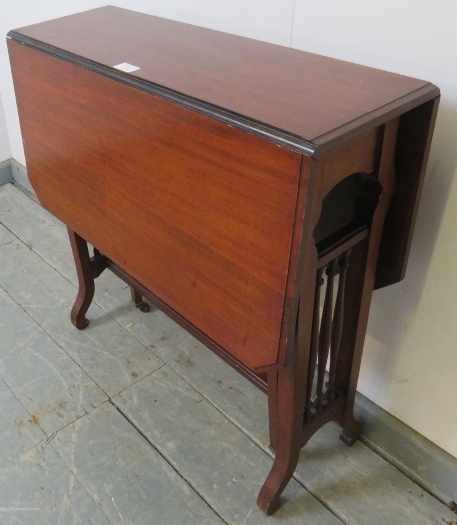 An Edwardian mahogany Sutherland table, with turned spindles to either side, on scrolled supports. - Image 2 of 4