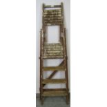 An unusual vintage double platform stepladder by ‘Spelga’. H168cm W56cm D85cm (approx). Condition