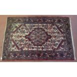 Injalas rug, red design on beige ground. 162cm x 105cm. Condition report: As seen.