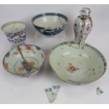 11 18th century Chinese bowls, plates and vases. Condition report: All broken, some staple