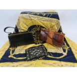 A vintage crocodile skin handbag and coin purse, a black lizard skin style hand bag, a beaded velvet