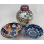 Two antique Japanese porcelain bowls and a 20th century enamelled Japanese covered jar with seal