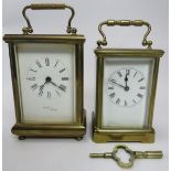 An early 20th century brass cased carriage clock, with key, 11cm high to top of case. Together