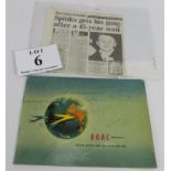 1956 Olympic team autographed B.O.A.C. flight brochure with newspaper cutting relating to an