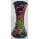 Charlotte Rhead for Bursley Ware, a "Seed Poppy" tube-lined vase. 19.5cm high. Condition report: