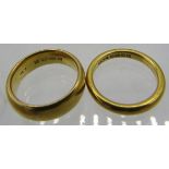 Two 22ct yellow gold wedding rings. Approx weight 17.7 grams. Condition report: Some surface