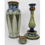 A group of three Doulton Lambeth stoneware objects. Comprising a candlestick with impressed