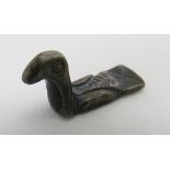 A Celtic Iron Age white metal miniature duck, circa 200 BC. 0.7 in (1.7 cm) length. Condition