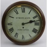 A mahogany cased circular dial wall clock, 19th century. Marked for Simmons & Sons, Launceston.