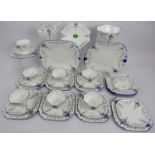 A Shelley Art Deco 'Blue Iris' pattern thirty three piece part tea set in the 'Queen Anne' shape.