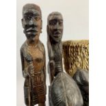 Collection of African carved figures and heads. Assorted hard woods and zebra skin drum, 16cm
