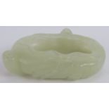 A Chinese carved pale celadon Jade brush washer, of leaf and stem form with a toad, Ming style but