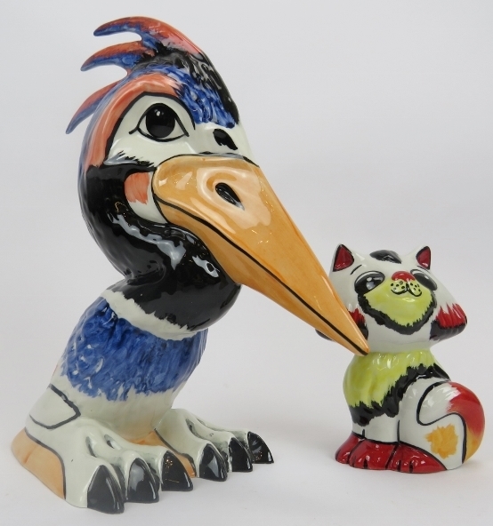 Two Lorna Bailey ceramic figures. Comprising a crested parrot and cat. Both signed beneath. (2