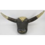 African carved wood cow head mask, paint and pigment, 16" height x 28" wide. Condition report: