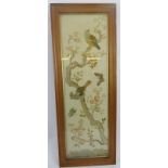 Needle work panel of exotic birds and flowers. Glazed and framed. 29" height x 8.5". Condition