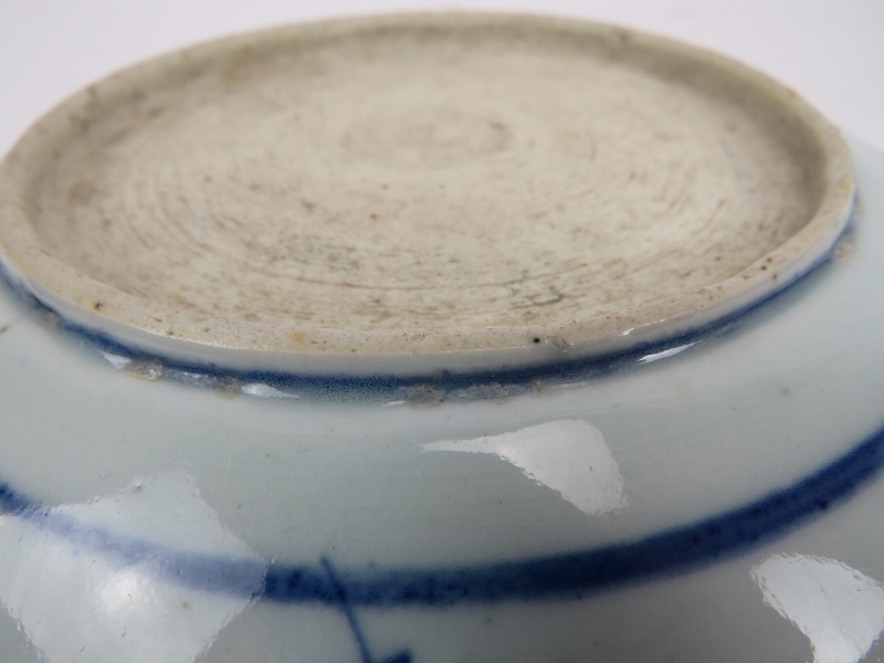 Two Chinese provincial blue and white porcelain dishes, 19th century. Both decorated in the same - Image 4 of 4