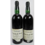 Two bottles of Taylors Crusted 1970 vintage Port. Condition report: Both approx bottom neck,