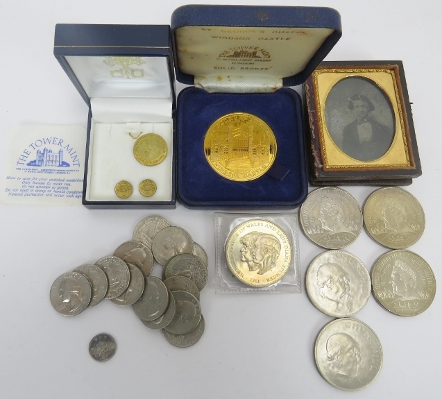 A collection of British commemorative coins and American coins. Also included is a Victorian