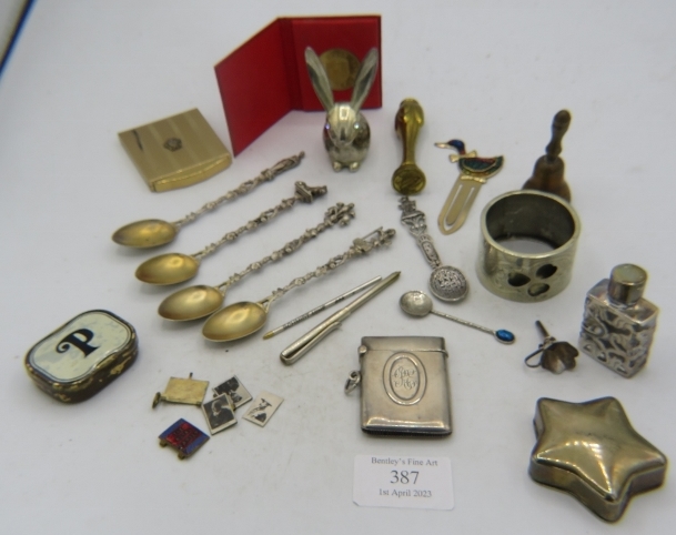 An assortment of various items to include a 925 marked scent bottle & funnel. A silver vesta case,