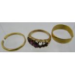 A 15ct marked yellow gold ring set with three amethysts (2 missing), and two broken 22ct gold