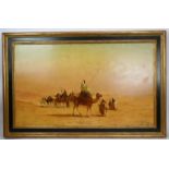 A. Balfour (1889) - 'Dessert scene with a camel train'. oil on canvas signed and dated, 56cm x 94cm,
