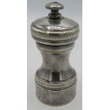 A French white metal pepper grinder. Marks to the side. Approx: 4" high. Condition report: Some