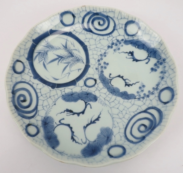 A group of Japanese ceramics. Comprising a blue and white dish, 32cm diameter, an Imari fluted dish, - Image 2 of 11