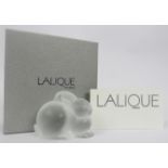 A modern Lalique frosted glass rabbit paperweight. Signed beneath. Title: ‘Motif Lapin Couche’.