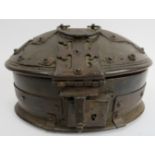 A rare Continental iron clad wooden table casket, 16/17th century. Of oval form with a domed